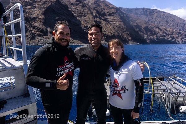Greg and Rebecca Claxton with crewmember on shark cage diving expedition in Guadalupe, Mexico.