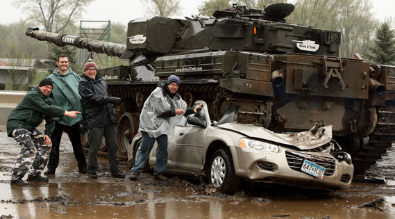 Tank crushes a car