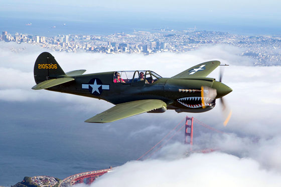 P40 Warhawk flies over the Golden Gate Bridge, San Francisco CA